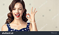 stock-photo-pin-up-retro-girl-with-curly-hair-winking-smiling-and-showing-ok-sign-presenting-you.jpg