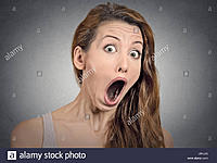 surprise-astonished-woman-closeup-portrait-woman-looking-surprised-J5YJ15.jpg