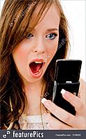 female-looking-at-cell-phone-stock-image-1100395.jpg