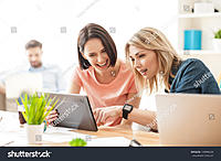 stock-photo-cute-young-female-workers-are-resting-in-office-410096530.jpg