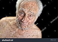 stock-photo-striking-image-of-an-old-man-on-black-61135825.jpg